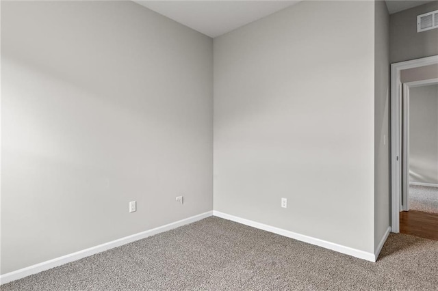 empty room featuring carpet