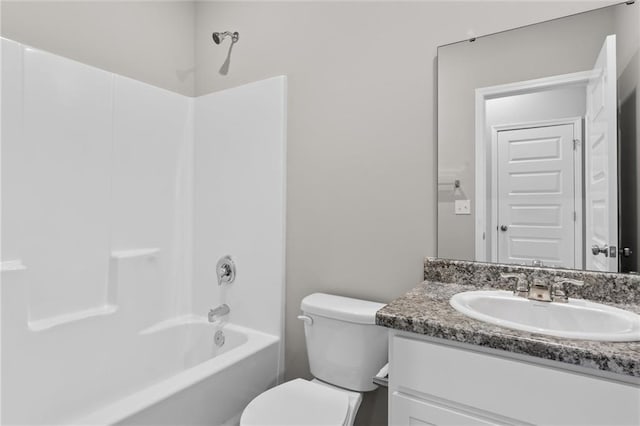 full bathroom with vanity, toilet, and shower / bathtub combination