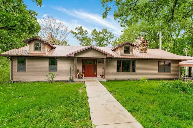 ranch-style home featuring a front yard