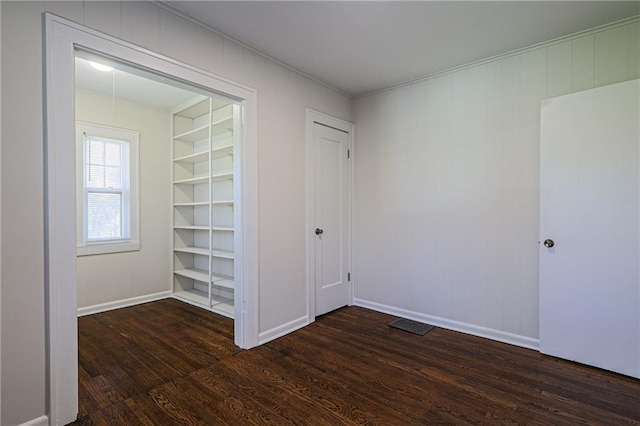 interior space with dark hardwood / wood-style floors