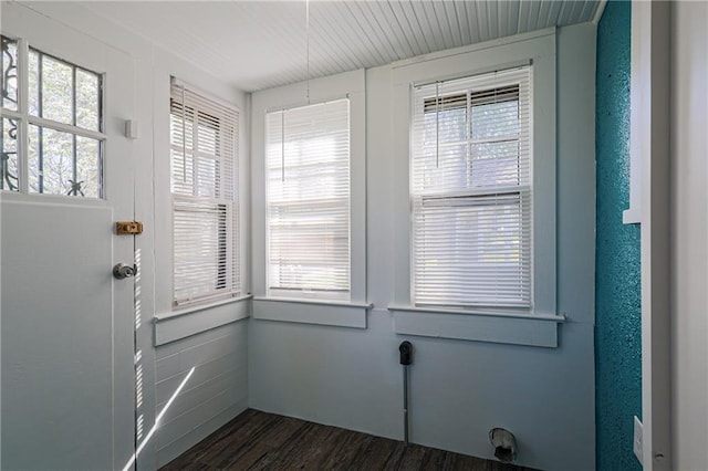 spare room featuring dark hardwood / wood-style floors