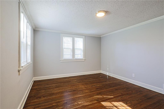 spare room featuring crown molding, a textured ceiling, and dark wood-type flooring