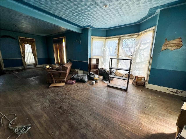 interior space featuring hardwood / wood-style floors, a textured ceiling, and a wealth of natural light