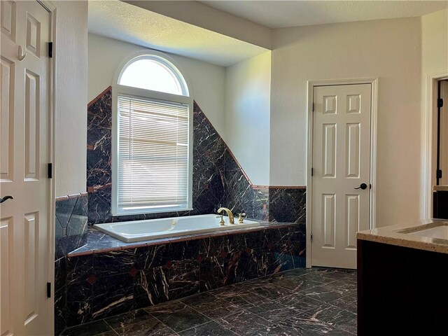15523A W 303rd St, Paola, KS 66071 - bathroom featuring tile flooring, vanity, and tiled bath