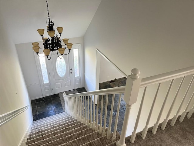 15523A W 303rd St, Paola, KS 66071 - interior space with a notable chandelier and dark colored carpet