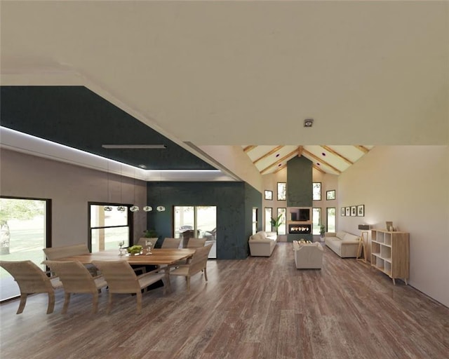 dining space with wood-type flooring and lofted ceiling