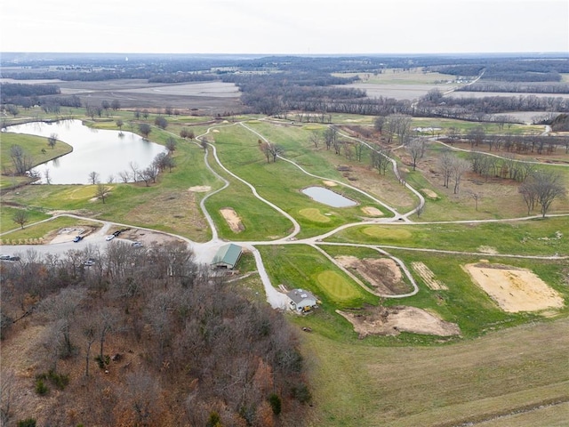 drone / aerial view with a rural view and a water view