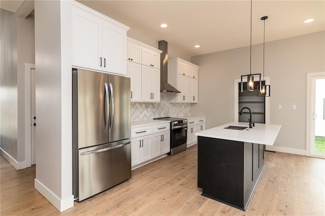 149 S Linn Valley Dr, Linn Valley, KS 66040 - kitchen featuring stainless steel appliances, wall chimney range hood, a sink, light countertops, and recessed lighting