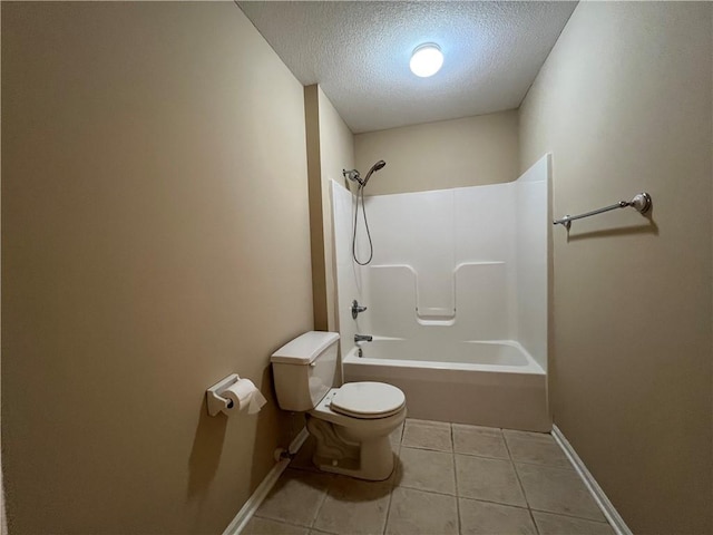 bathroom featuring a textured ceiling, toilet, shower / bath combination, and tile patterned floors