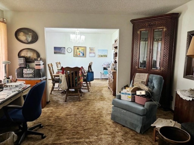 carpeted office with an inviting chandelier and a textured ceiling