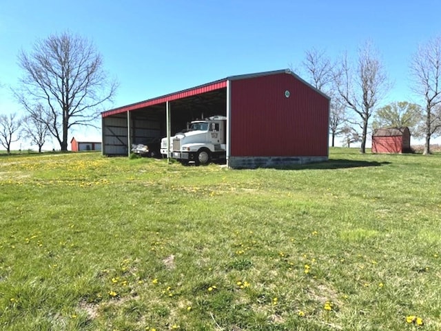 view of shed / structure featuring a yard and a carport