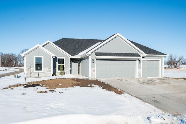 ranch-style home featuring a garage