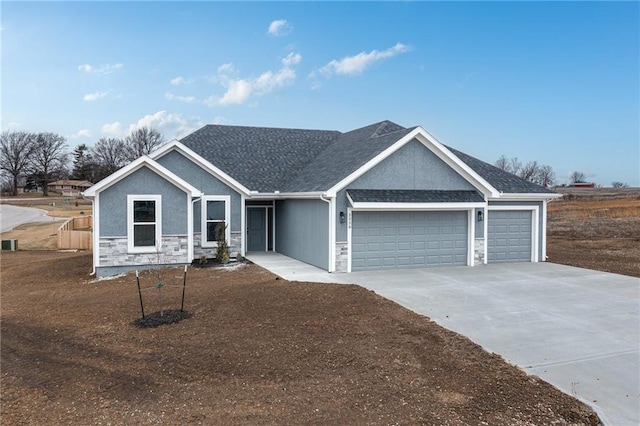 craftsman inspired home with a garage