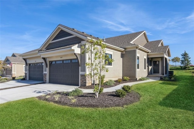 craftsman-style house with a front yard, central AC unit, and a garage