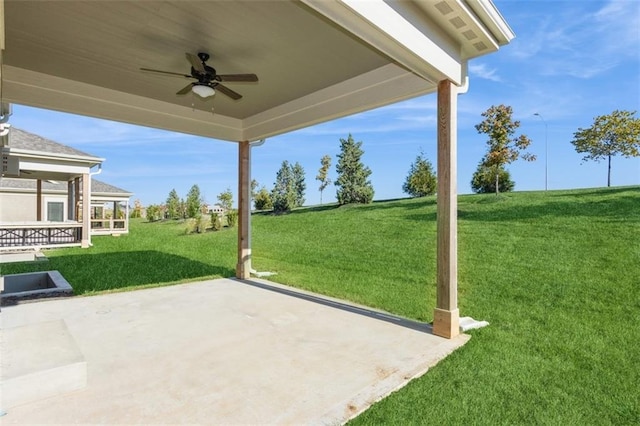 view of patio featuring ceiling fan