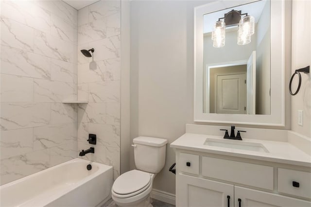 full bathroom featuring vanity, toilet, and tiled shower / bath