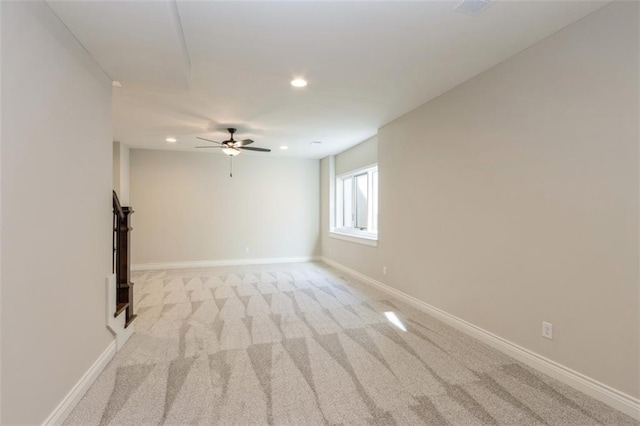 carpeted empty room with ceiling fan