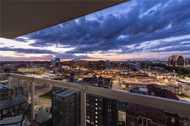 view of balcony at dusk