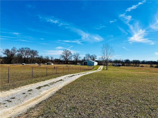 view of street featuring a rural view and driveway