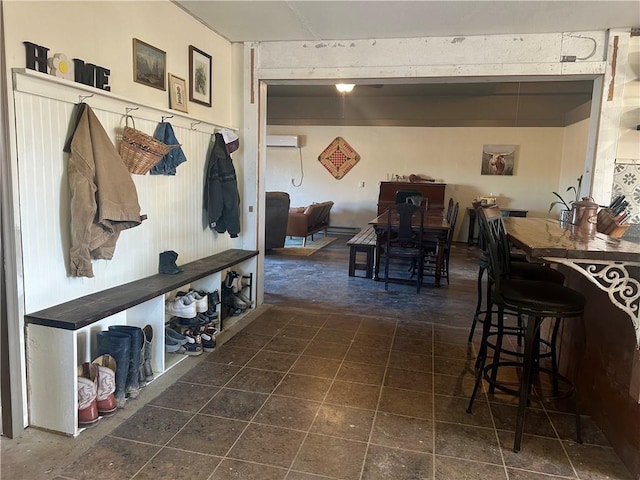 mudroom featuring a wall mounted AC