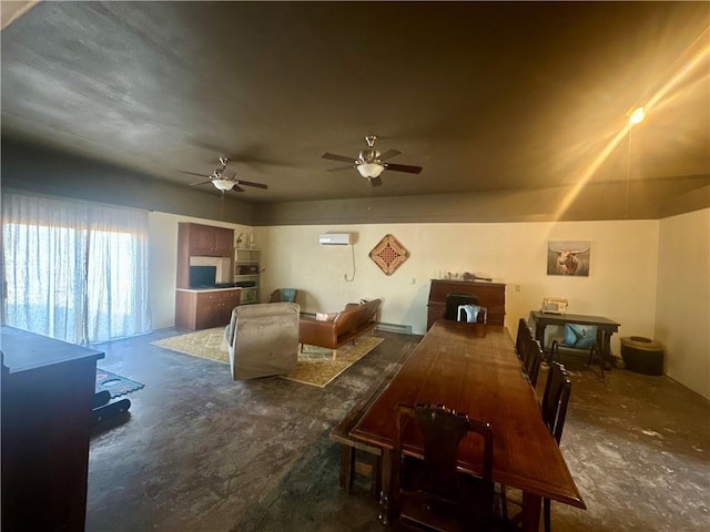 dining space with a ceiling fan and baseboard heating