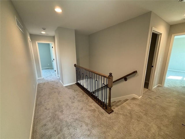 staircase with carpet