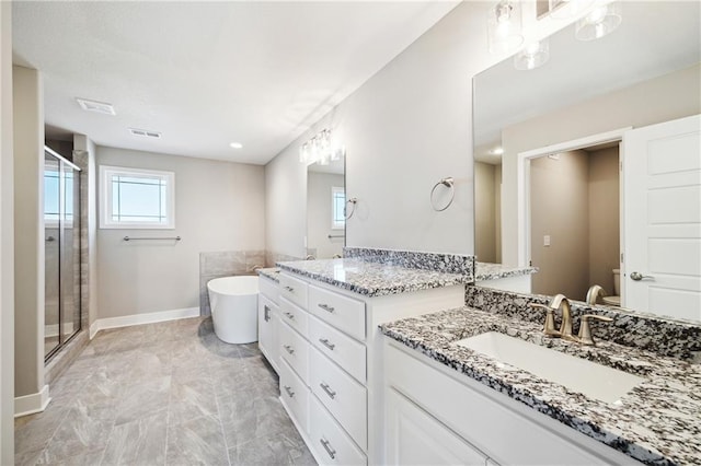 bathroom with plus walk in shower and vanity