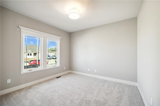 view of carpeted spare room