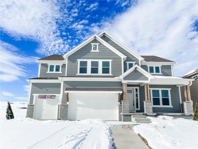 craftsman-style home featuring a garage