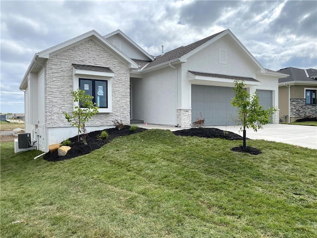 view of front of property featuring a front lawn, cooling unit, driveway, stone siding, and an attached garage