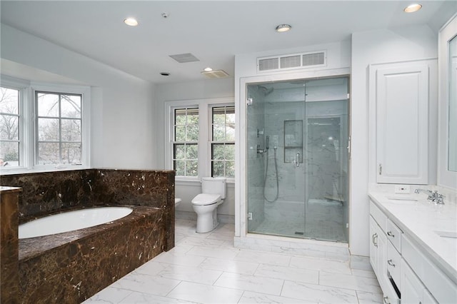 full bathroom with vanity, toilet, and plus walk in shower