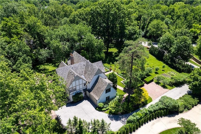 3700 W 65th St, Mission Hills, KS 66208 - aerial view of property and surrounding area with a heavily wooded area