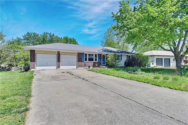 single story home with a garage and a front yard