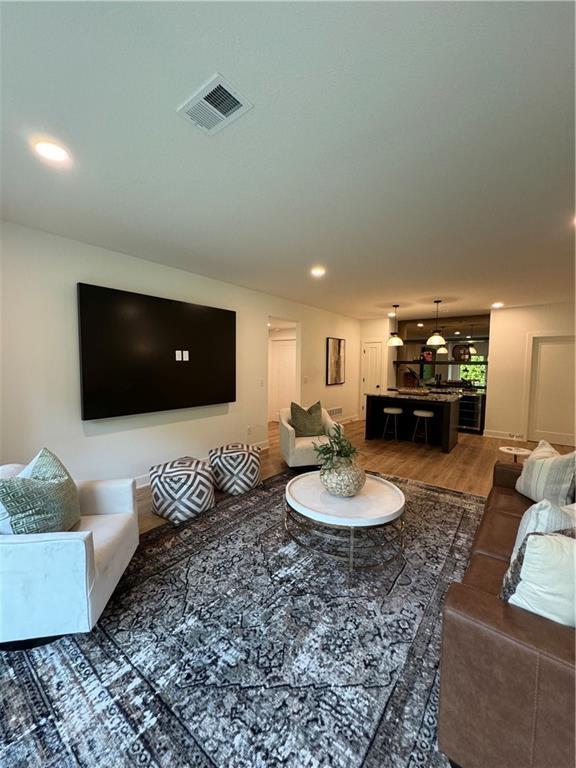 living room with wood-type flooring