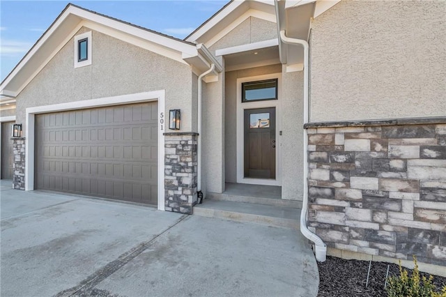 entrance to property featuring a garage