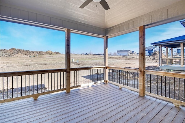 wooden terrace with ceiling fan