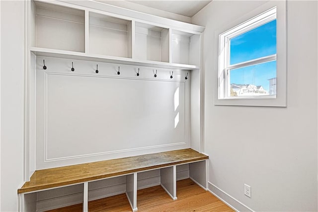 mudroom with hardwood / wood-style flooring