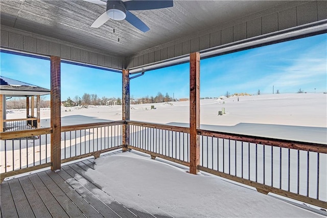 snow covered deck with ceiling fan