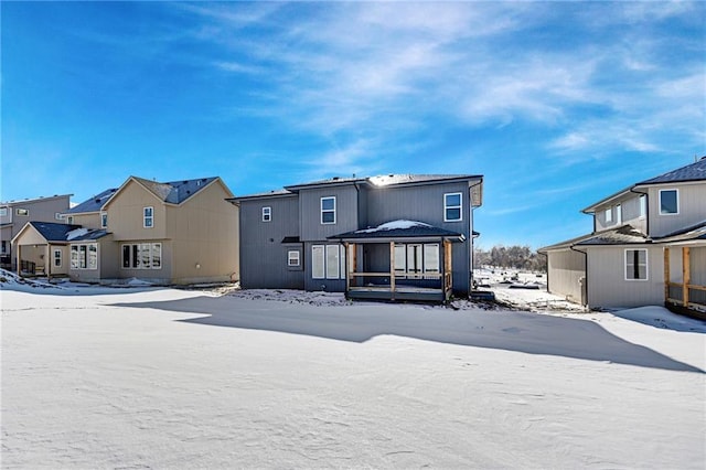 view of snow covered property