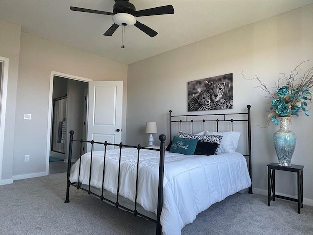 bedroom featuring ceiling fan and carpet