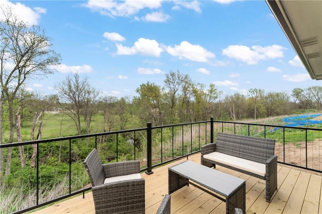 deck with outdoor lounge area