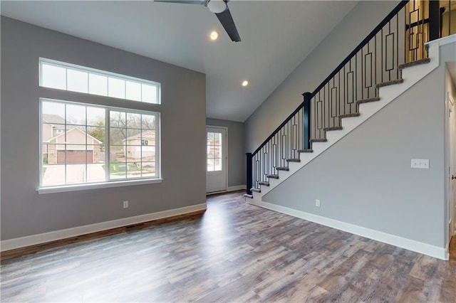 foyer with hardwood / wood-style flooring and ceiling fan