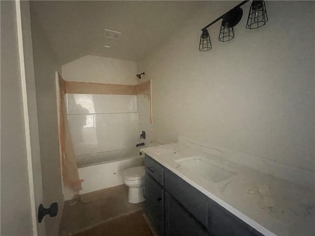 bathroom featuring toilet, shower / tub combo with curtain, and vanity