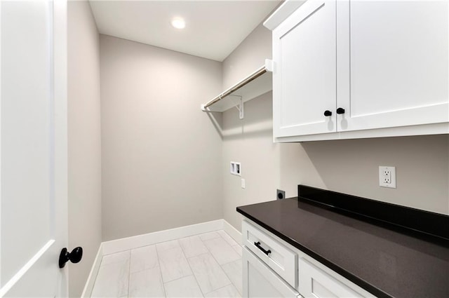 washroom with cabinet space, baseboards, washer hookup, electric dryer hookup, and recessed lighting