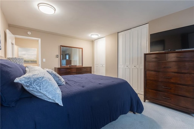 bedroom with light carpet