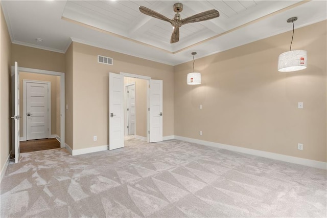 unfurnished bedroom featuring ornamental molding, beam ceiling, carpet, and ceiling fan