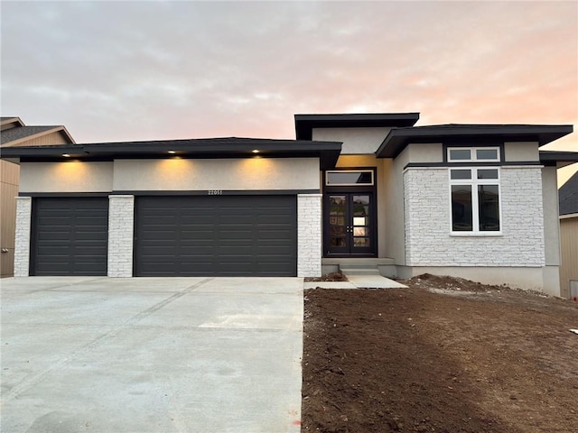 prairie-style home with a garage