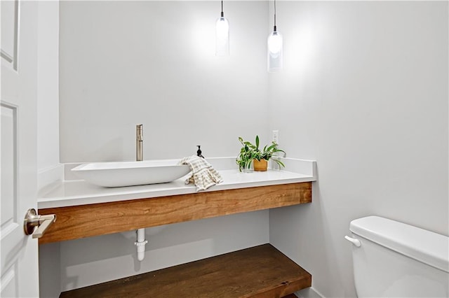 bathroom with sink and toilet