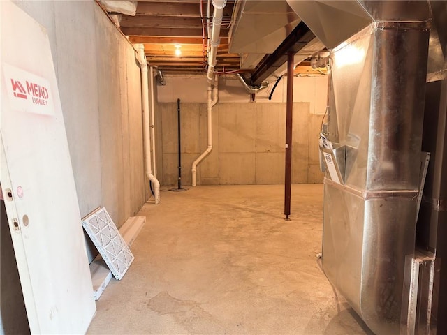 basement featuring heating unit