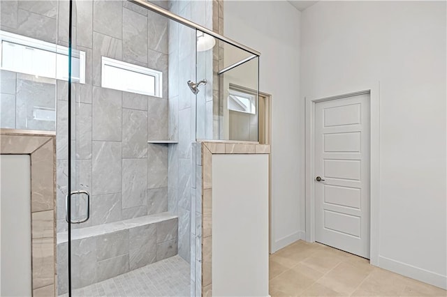 22051 W 100th Ter, Lenexa, KS 66220 - bathroom with a stall shower and baseboards